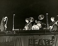 The Beatles performing at the Gator Bowl in 1964.