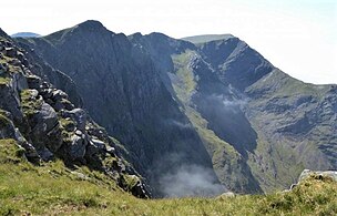 Northeast face of Ben Lugmore, and Lug More corrie, with The Ramp (green, in sunlight) crossing it, viewed from east spur of Ben Lugmore
