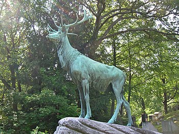 The bronze elk statue by Eli Harvey on the grave of Edward Leach