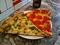 Slices of New York-style pizza