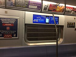 The interior of an R160 car, number unknown, with an experimental LCD screen