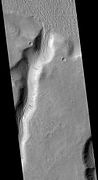 Tinia Valles, as seen by HiRISE. Full size image shows dark slope streaks.