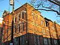 Exterior of the school as demolition begins