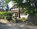 Wohnhaus Claußen mit Einfriedung