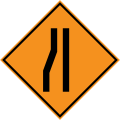 Road narrows on the left