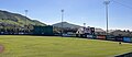 Cal Poly Mustangs baseball players practice in the outfield before a home game during the 2023 season.