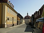 Street in a town, a church building at the end