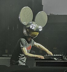 DJ with a mouse head mask performing live