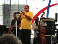 Ravi Coltrane (left, in black shirt) with Terell Stafford and Charnett Moffett at the Newport Jazz Festival on August 13, 2005.