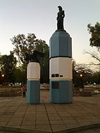 San Martín memorial at the middle of the namesake garden square in downtown at twilight.