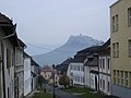 Road in Spišská Kapitula with Spiš Castle above