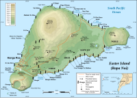 A triangular island, at one point a mountain with a large crater pokes out of the sea. Most of the mountain has been eroded back to a sea cliff surrounding a crater, only a fifth of the mountain slopes gently to the corner of the island.