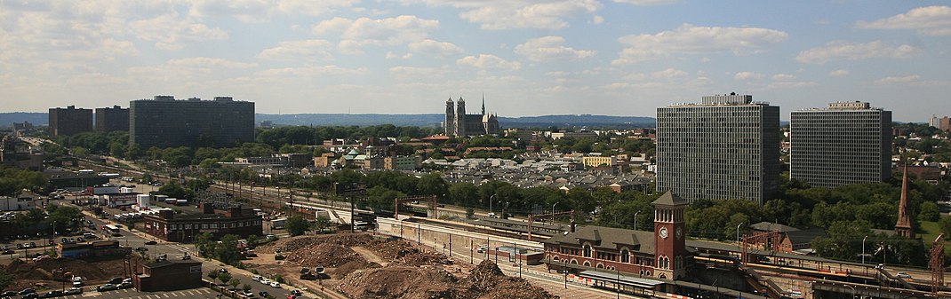 From left to right: Garden Spires Apartments (not related to Mies), Colonnade Apartments, Branch Brook Park, Cathedral Basilica of the Sacred Heart, Pavilion Apartments, Newark Broad Street Station, House of Prayer Episcopal Church and Rectory. Photo taken from One Washington Park office tower.