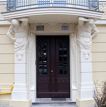 View of the entrance portal with atlases