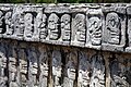 Aztec carving of a "wall of skulls," carved into a stone building