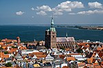 City panorama with a red brick church