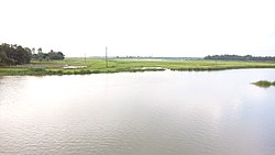 Bilkumari Bil beside the river Shiba
