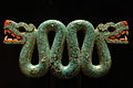 Aztec carving of a snake, made in wood and covered with turquoise