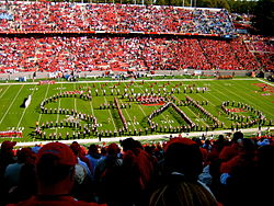 North Carolina State University marching band performing during a football game