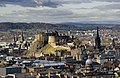 Image 5Edinburgh Castle is a fortress which dominates the skyline of the city of Edinburgh, from its position atop the volcanic Castle Rock. Human habitation of the site is dated back as far as the 9th century BC, although the nature of early settlement is unclear. There has been a royal castle here since at least the reign of King David in the 12th century, and the site continued to be a royal residence until the Union of the Crowns in 1603.