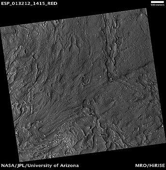 Région au terrain tourmenté près de Reull Vallis[164], 38,3° S et 96,9° E.