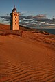 Lighthouse being encroached by the sand dunes