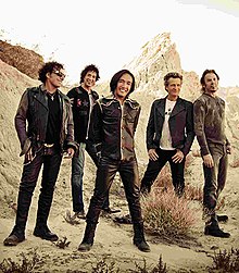 Journey in 2013 from left to right: Neal Schon, Deen Castronovo, Arnel Pineda, Ross Valory, Jonathan Cain