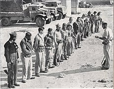 Palmach soldiers are instructed before Operation Yoav