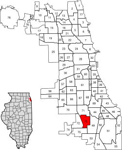 A pictorial depiction of the 77 Chicago community areas are in white. Area #73, Washington Heights (in the city's southwest corner), is highlighted in red.