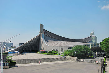 A far view of a stadium, with suspension roof design.