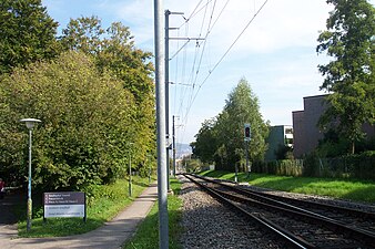 Looking downhill towards Zurich with an entrance to the Stadtspital Triemli to the left