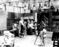 Image 39A.E. Smith filming The Bargain Fiend in the Vitagraph Studios in 1907. Arc floodlights hang overhead. (from History of film)