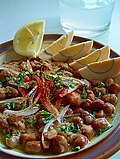 Ful medames served with sliced hard-boiled eggs