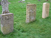 Diana's grave at far right, next to those of her sisters, Unity and Nancy, at St Mary's Church, Swinbrook in Oxfordshire.