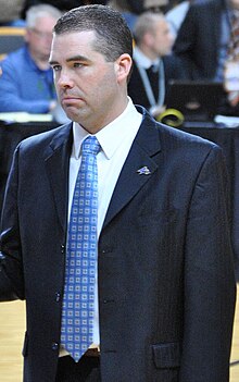 Nick McDevitt, talking to a referee as head coach of the UNC Asheville Bulldogs