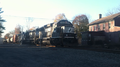 Norfolk Southern westbound delivery train passing through Three Bridges, Readington Township, New Jersey on the Lehigh Line, Picture 2- from back of train part one