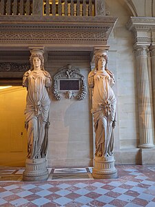 Caryatides supporting the musical tribune by Jean Goujon