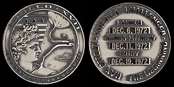 Apollo 17 mission emblem and crew names (front). Dates (launch, lunar landing, and return) and landing site (back)