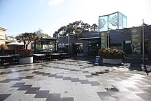 View of paved square and buildings