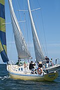 The ketch-rigged sailing vessel, Pepa, viewed from astern and slightly to the port, as she sails on a starboard tack.