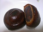 Manjū is a popular traditional Japanese confection; most have an outside made from flour, rice powder and buckwheat and a filling of red bean paste, made from boiled azuki beans and sugar.