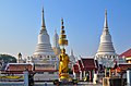 The temple and white stūpas