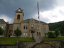 Large, stone courthouse atop a hill