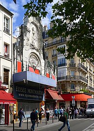 Le boulevard au niveau du no 72 (l'Élysée-Montmartre).