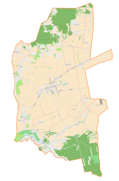 Mapa konturowa gminy Skomlin, po lewej nieco na dole znajduje się punkt z opisem „Toplin”