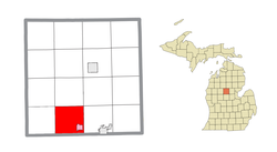 Location within Clare County (red) and the administered village of Farwell (pink)