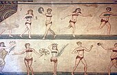This mosaic, called the Coronation of the Winner and nicknamed the bikini girls, shows Roman women engaged in athletic activities such as swinging a discus, hitting a ball to each other, and stepping whilst using dumbbells. Villa Romana del Casale, 4th century AD.