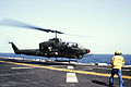 AH-1T Cobra takes off from USS Guadalcanal in 1987.