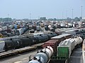 Image 16Various types of railroad cars in a classification yard in the United States (from Train)