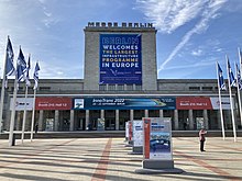 Banner "Berlin welcomes the largest infrastructure programme in Europe. Solidarity Transport Hub. Poland." InnoTrans 2022, Berlin.